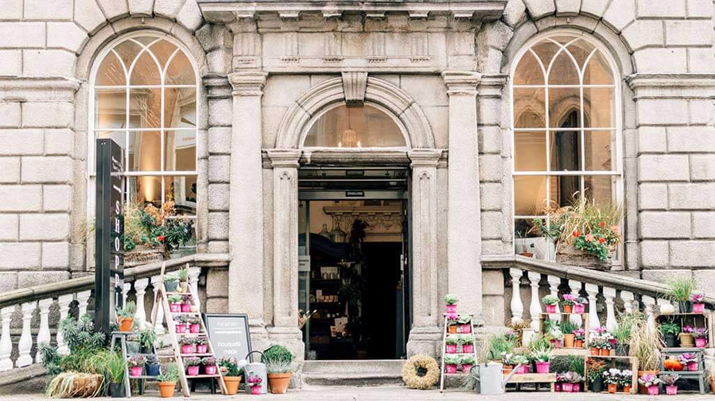 Image of building in Dublin with flowers outside